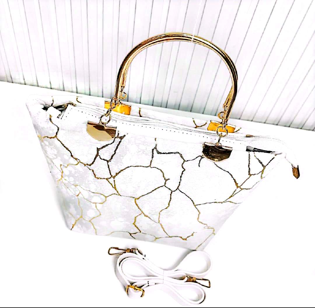 Elegant Printed Handbag with Gold Handle